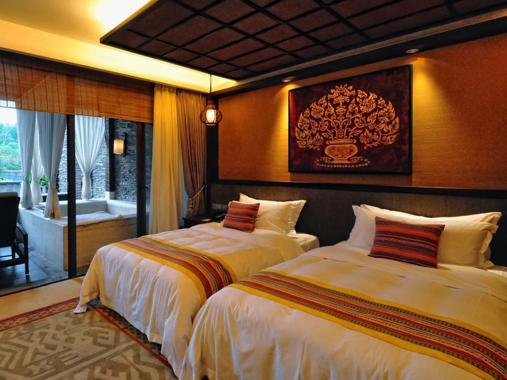 The Tang Hotel Hainan Mount Qixian Baoting Rom bilde